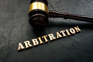 Arbitrator still in place despite unilaterally adjusting fees